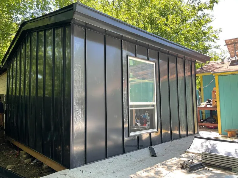 Black standing seam metal wall panels for Metal Roof Installation in New Albany